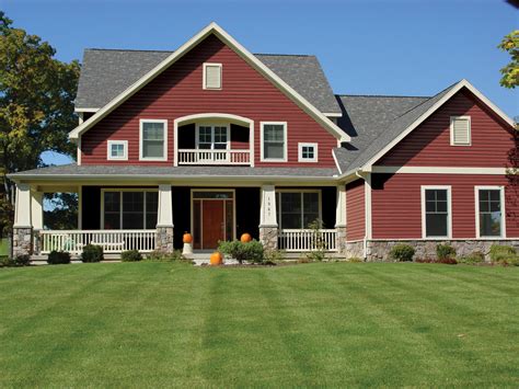 red house with siding and metal roof|red metal roof exterior homes.